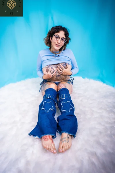 Big Titted Tatted MILF Image #4